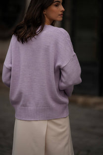 Maglia in maglia traforata con scollo a V