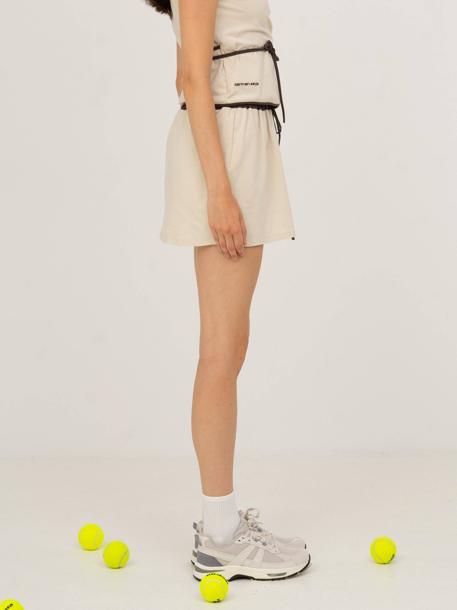 Gonna mini sportiva bianca con shorts interni