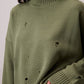 Maglione oversize effetto destroyed