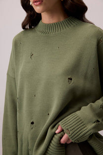 Maglione oversize effetto destroyed