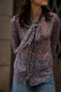 Blusa floreale lilla con fiocco