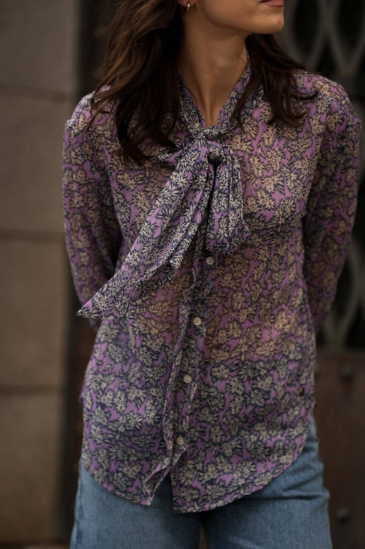 Blusa floreale lilla con fiocco