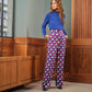 Pantaloni lunghi a vita alta con stampa geometrica