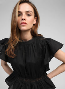 Blusa nera Salek con volant
