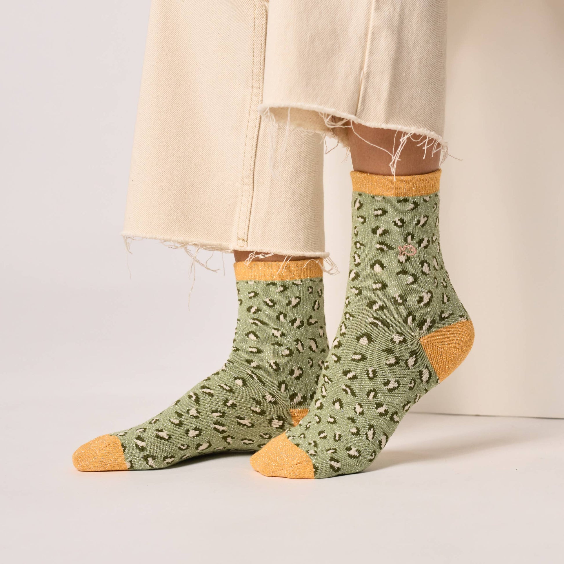 Calzini glitterati leopardati in cotone pettinato verde chiaro