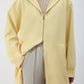 Giacca lunga con cappuccio e zip