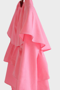 Blusa corta rosa con balze e maniche a sbuffo in misto cotone