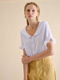 Blusa in cotone con colletto sailor e volant