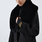Cappotto lungo nero con collo in pelliccia