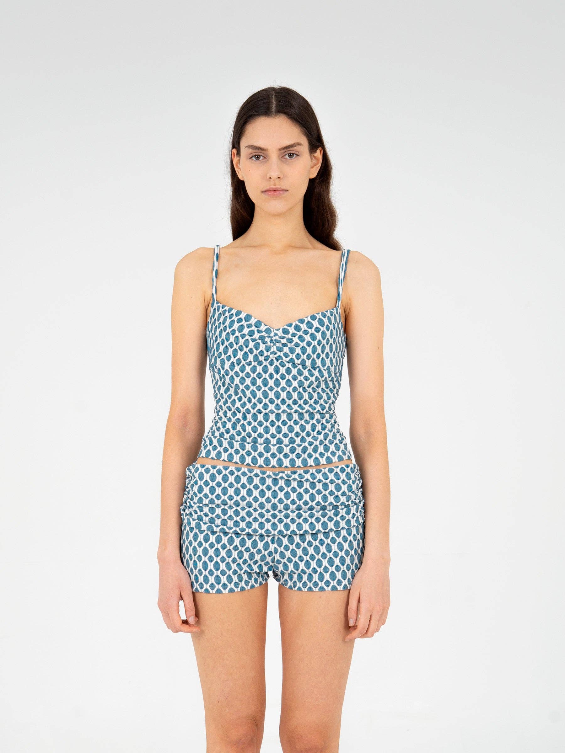 Top arricciato in jersey blu con scollo a cuore