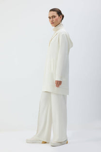 Giacca lunga con cappuccio e zip