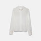 Blusa minimal con collo alto