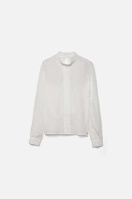 Blusa minimal con collo alto