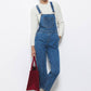 Salopette in denim blu con bretelle regolabili