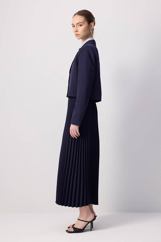 Completo gonna plissé e giacca corta elegante