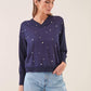 Maglia in viscosa con scollo a V e micro fantasia
