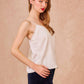 Top in raso con pizzo Faro