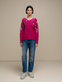 Maglione in maglia con paillettes sulle maniche