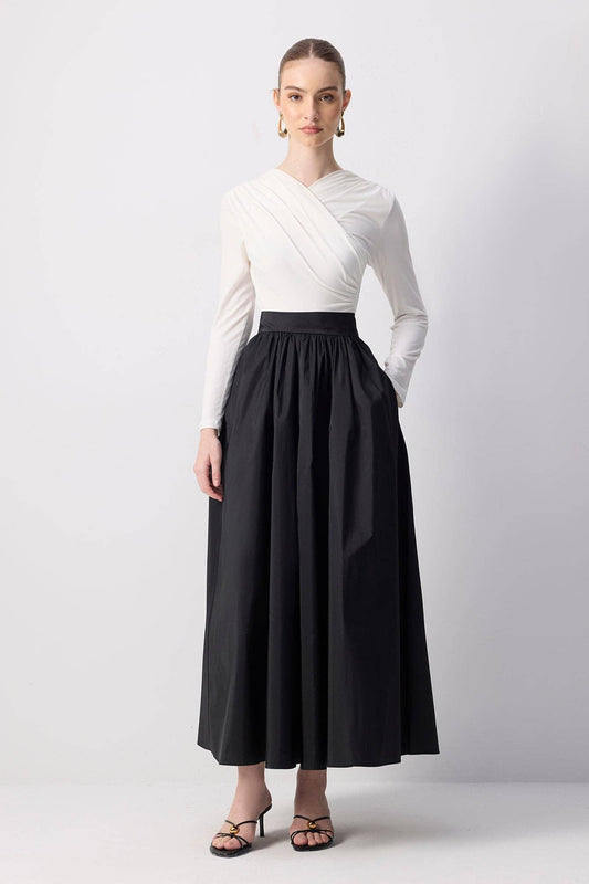 Gonna lunga elegante plissettata in taffetà a vita alta