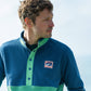 Felpa in pile bicolore blu navy e verde con bottoni