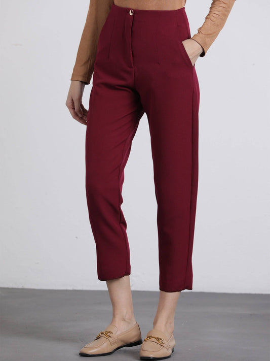 Pantaloni cropped bordeaux con bottoni dorati