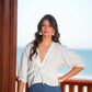 Blusa a righe con scollo a V e coulisse