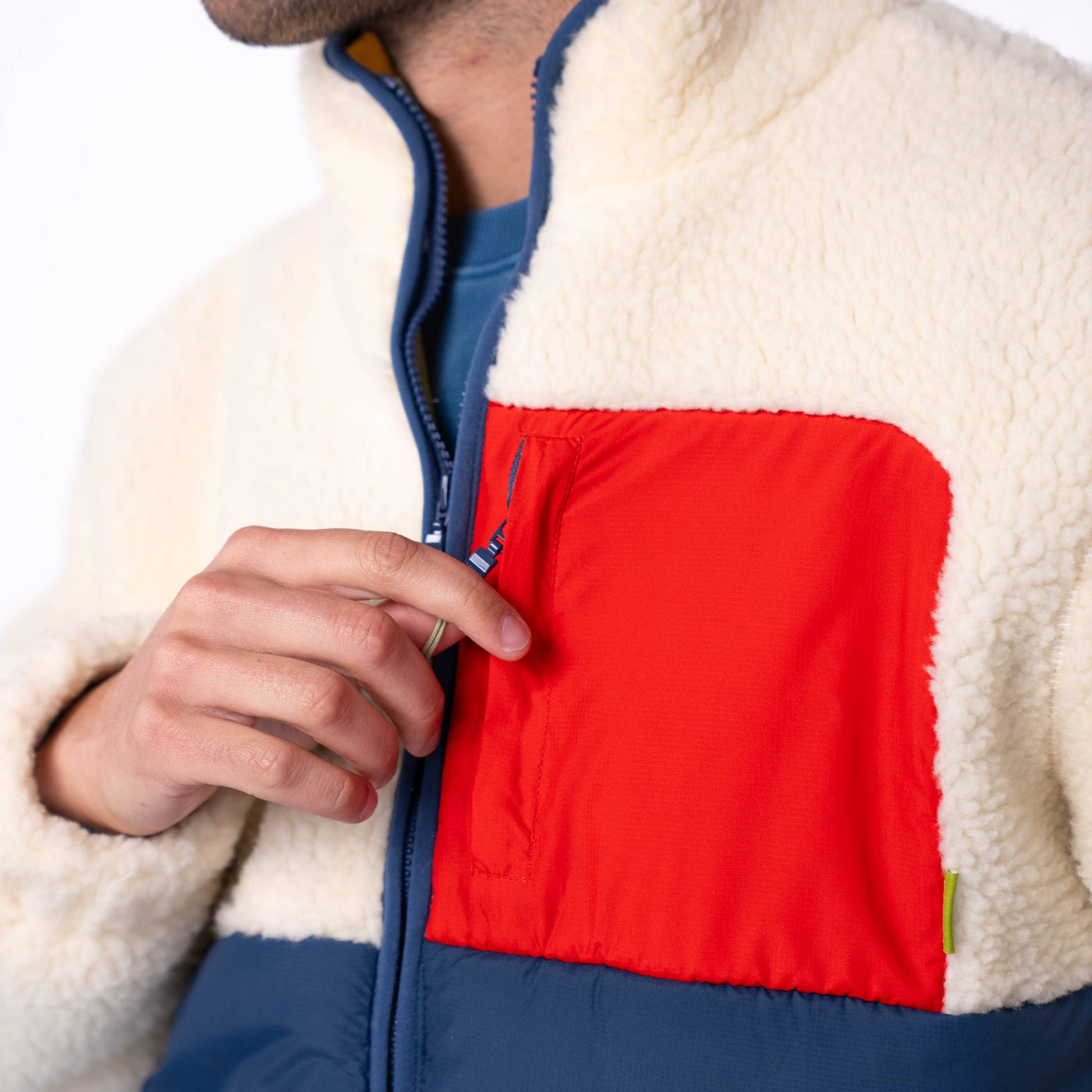Giacca sherpa color block avorio e blu navy