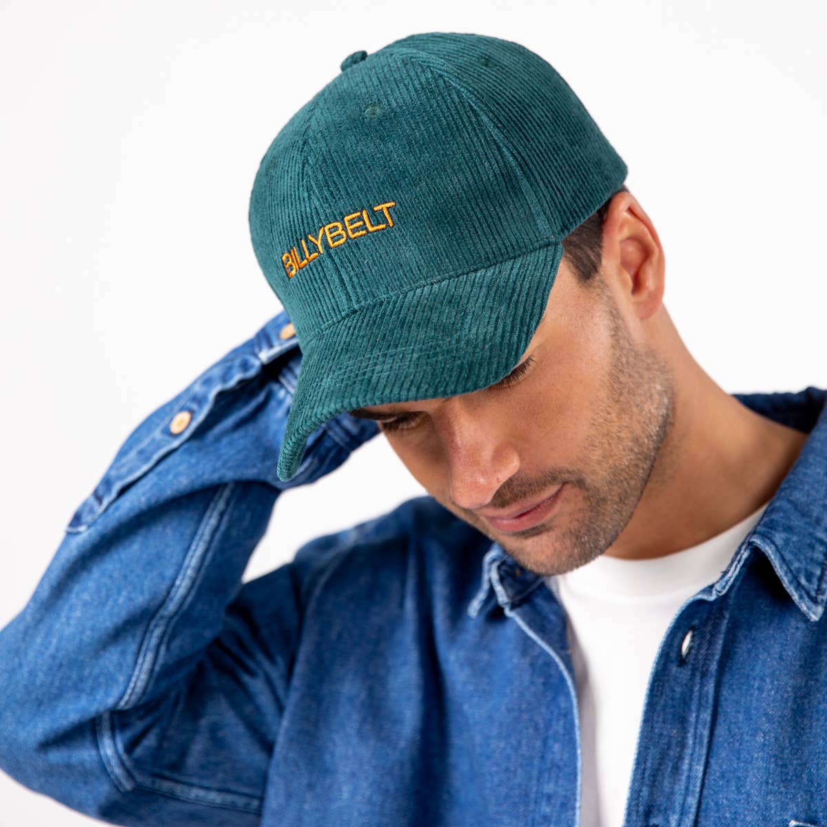 Cappellino in velluto a coste verde scuro