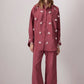 Camicia oversize rosa con applicazioni floreali 3D