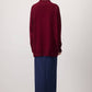 Tunica in maglia oversize con accessorio metallico