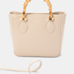 Borsa shopper in ecopelle con manici effetto bambù