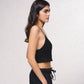 Top cropped all’uncinetto a triangolo
