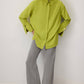 Camicia in popeline verde con polsini ampi