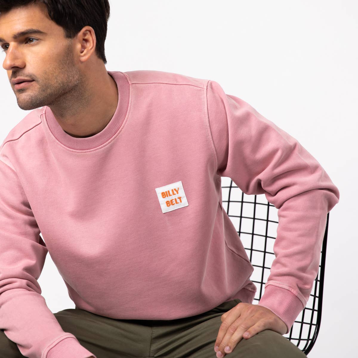 Felpa unisex rosa in cotone biologico con patch logo
