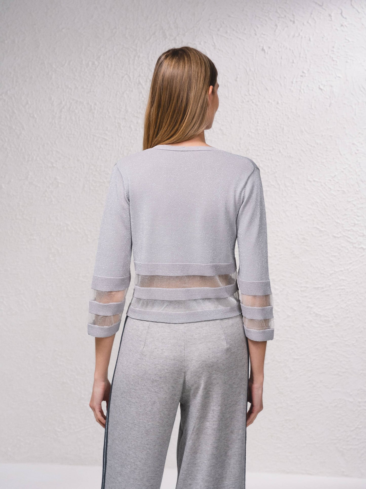 Giacca corta in maglia lurex con trasparenze