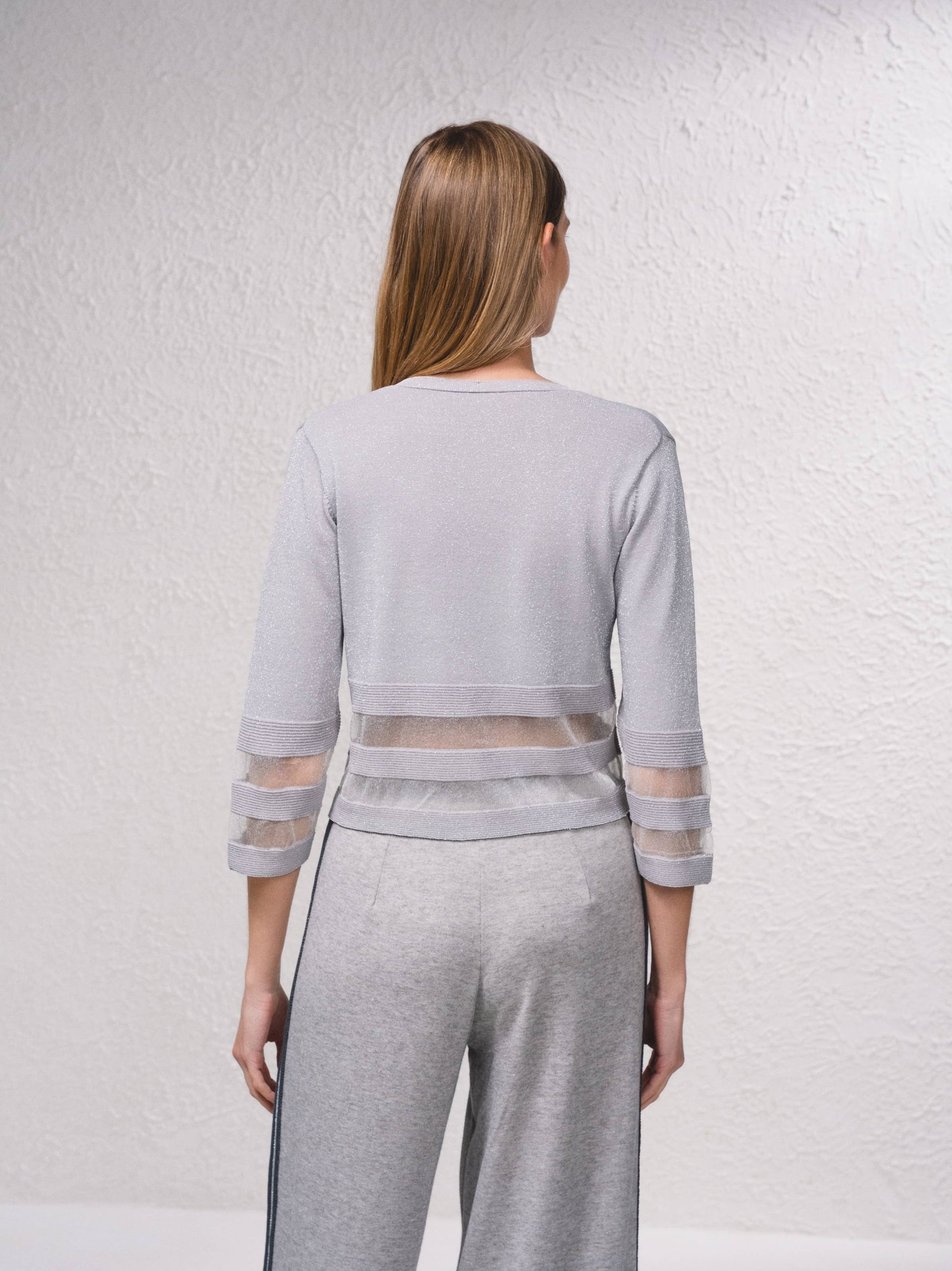 Giacca corta in maglia lurex con trasparenze