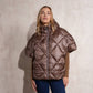 Cappa imbottita oversize con cappuccio e zip