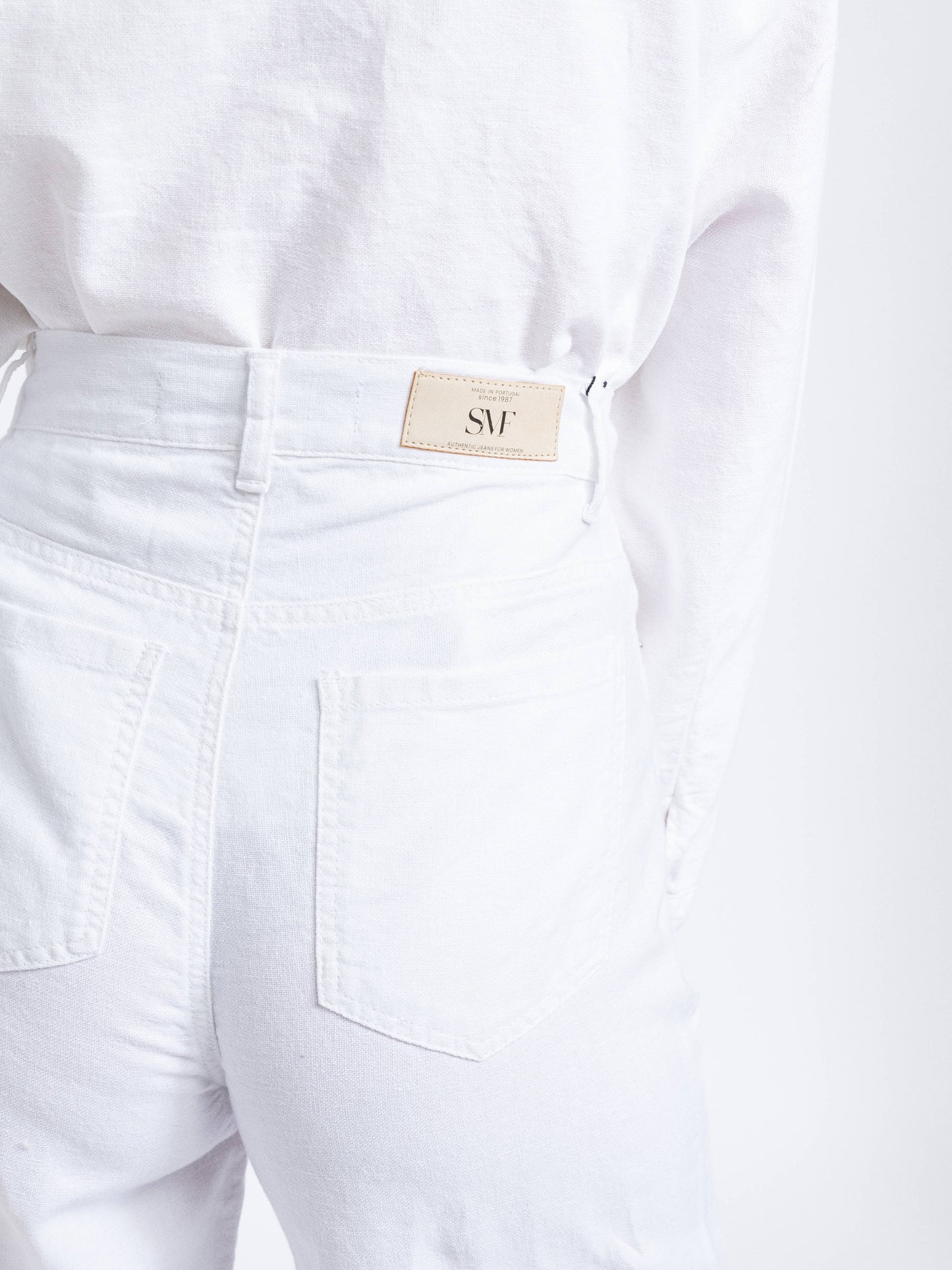 Pantaloni a vita alta a gamba ampia