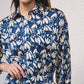 Blusa fluida in raso stampato