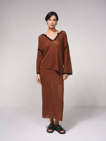 Maglione in maglia traforata con dettagli a contrasto e scollo a V