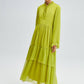 Abito lungo in chiffon con balze e fiocco al collo