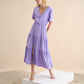 Abito midi in lino con balze e scollo a V