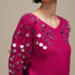 Maglione in maglia con paillettes sulle maniche