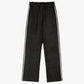 Pantaloni Pierroly effetto pelle neri con bande argento