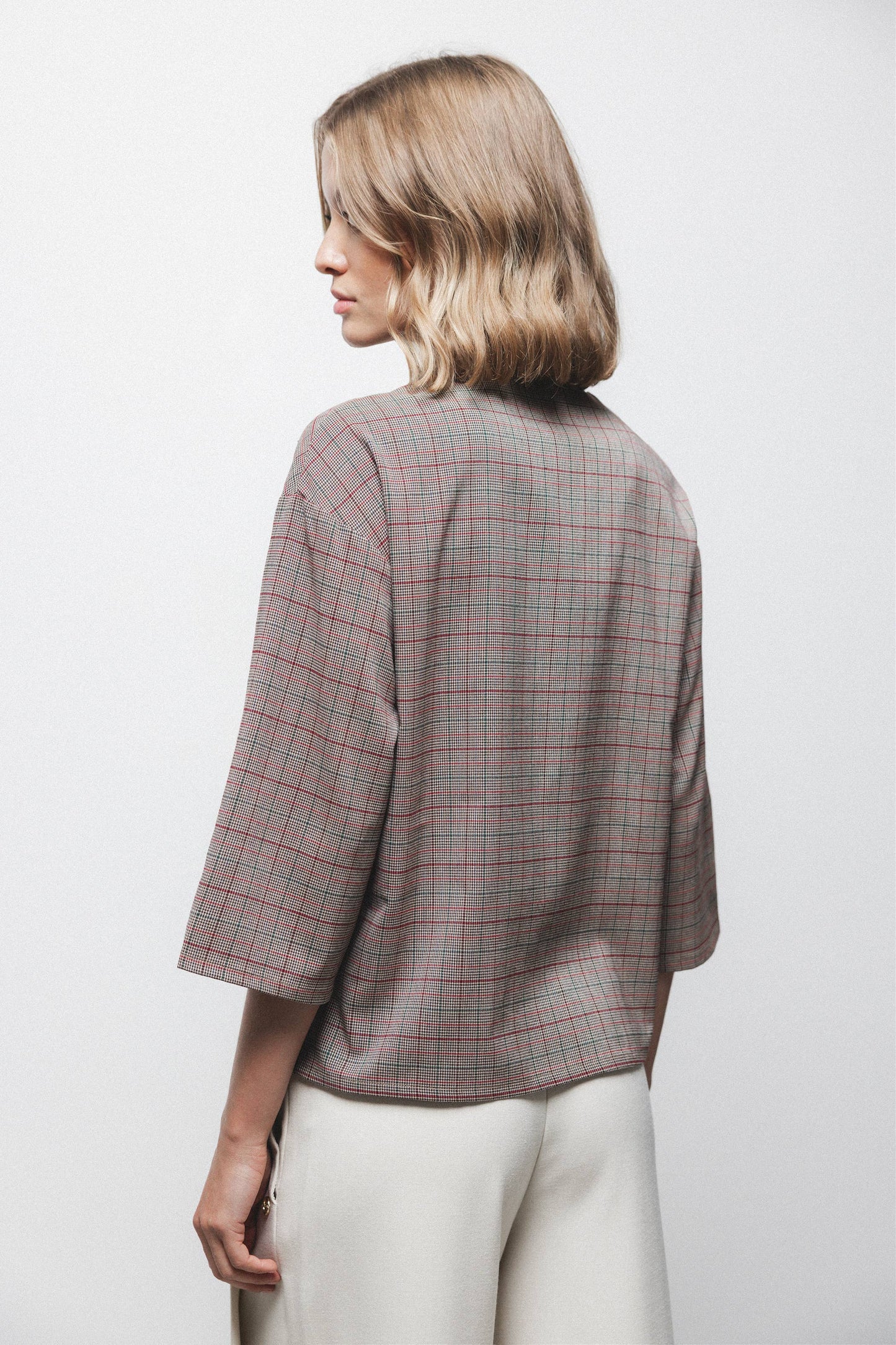 Blusa Principe di Galles con scollo a V