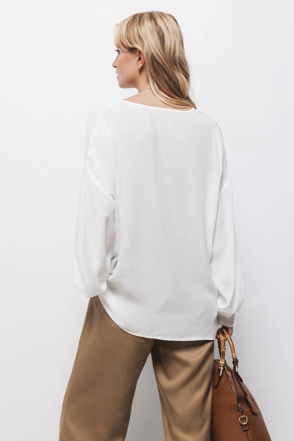 Blusa bianca con coulisse in vita