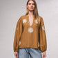 Blusa fluida ricamata in cotone