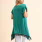 Tunica in maglia elasticizzata relaxed fit con frange