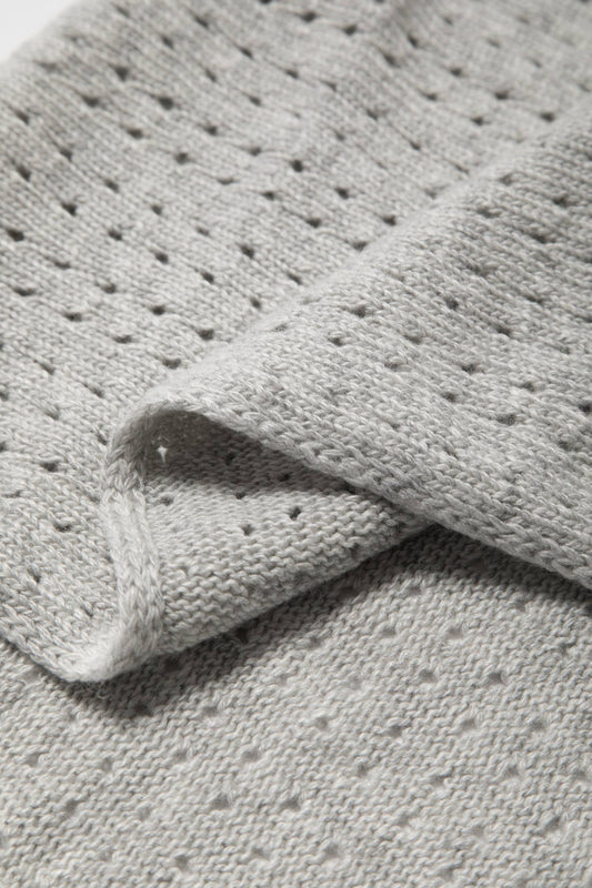 Sciarpa triangolare in maglia pointelle