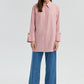 Camicia a righe rosa con polsini larghi